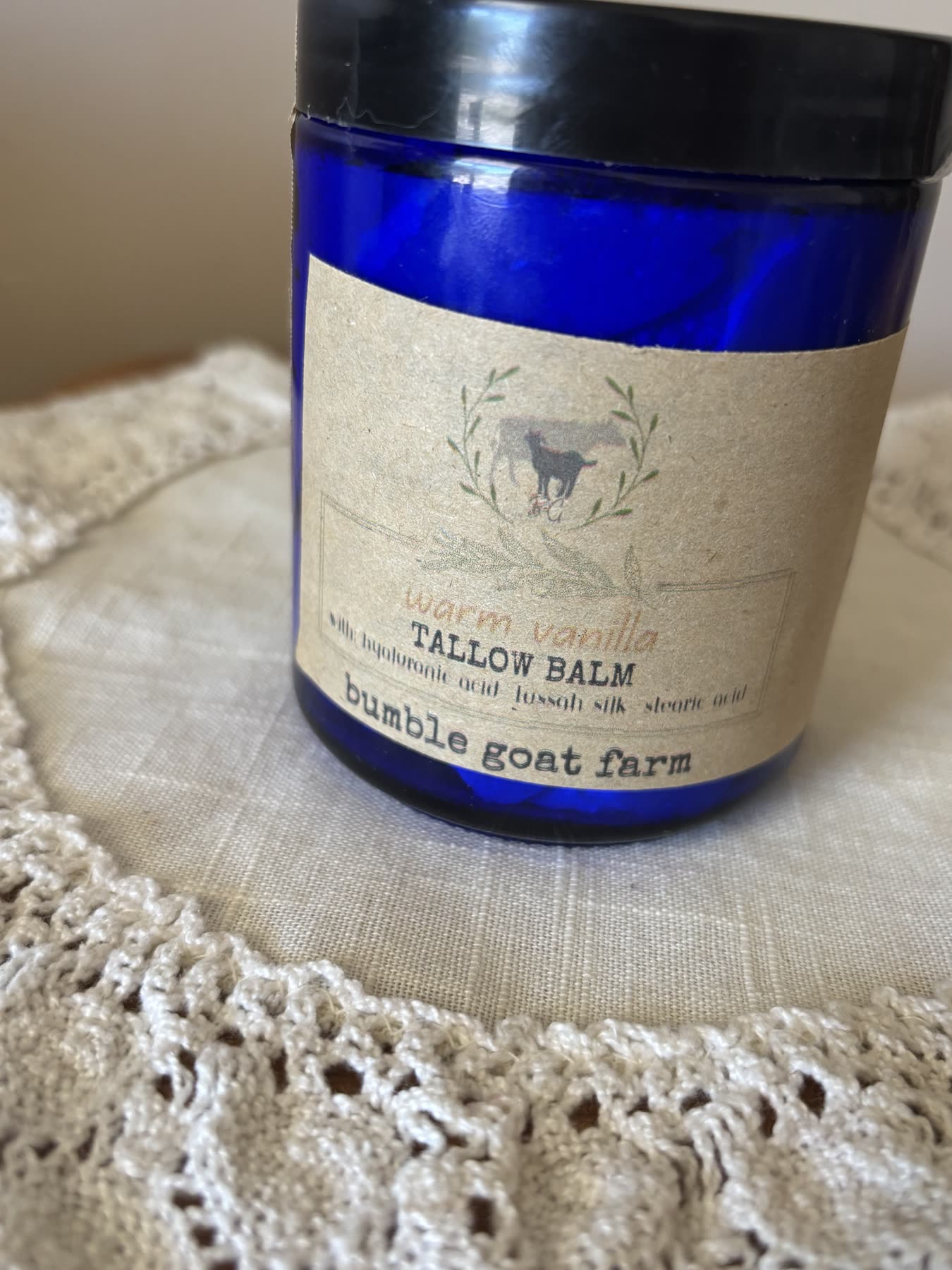 A blue jar of Bumble Goat whipped tallow balm