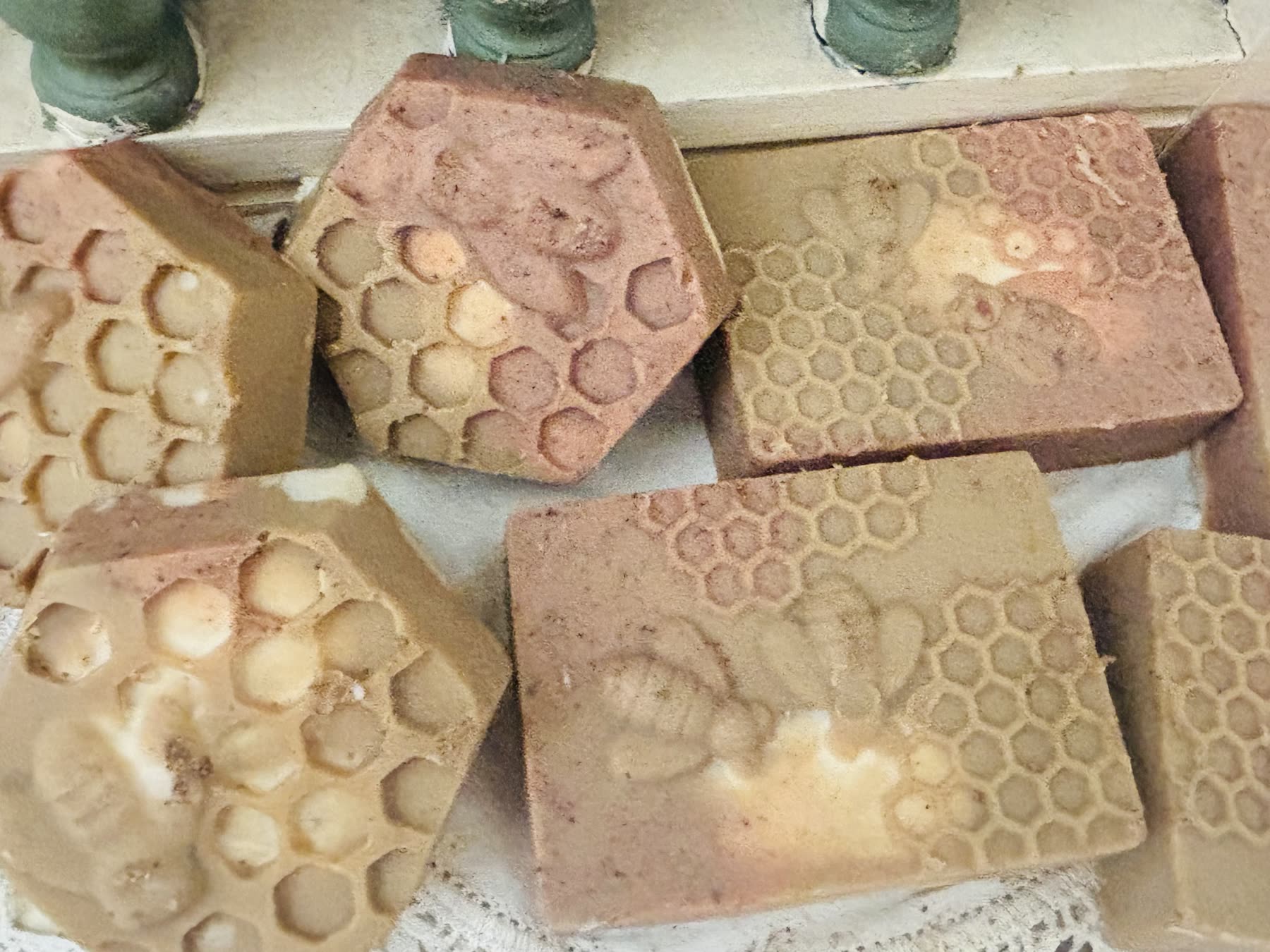Honeycomb-stamped soaps in pink and cream